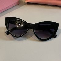 Miu Miu 6142 Cat-Eye Sunglasses In Acetate Black