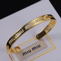 Miu Miu Cuff Bracelet With Cut-Out Logo In Metal Gold