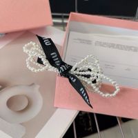Miu Miu Hair Clip With Monogram Strap Pearls Chain In Metal Black