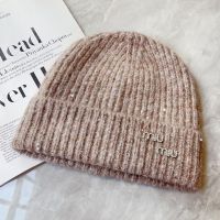 Miu Miu Knitted Hat With Strass Logo Patch In Wool Brown
