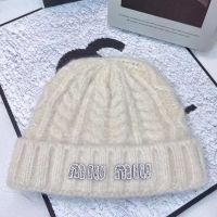 Miu Miu Knitted Hat With Strass Logo In Wool Beige