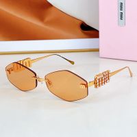 Miu Miu SMU 5692TS Sunglasses With Strass Logo In Metal Orange