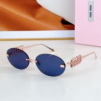 Miu Miu SMU 5693TS Oval Sunglasses With Strass Logo In Metal Blue