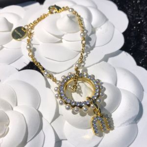 Miu Miu Bracelets With Strass Pearl Hoop Logo Pendant In Metal Gold