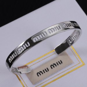 Miu Miu Cuff Bracelet With Cut-Out Logo In Metal Silver