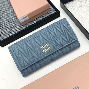 Miu Miu Large Flap Bifold Wallet In Matelasse Nappa Leather Navy Blue