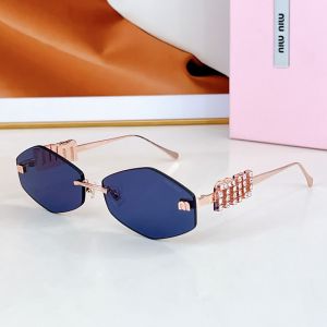 Miu Miu SMU 5692TS Sunglasses With Strass Logo In Metal Blue