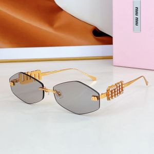 Miu Miu SMU 5692TS Sunglasses With Strass Logo In Metal Grey