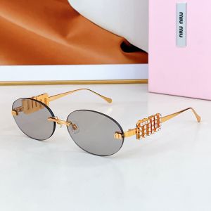 Miu Miu SMU 5693TS Oval Sunglasses With Strass Logo In Metal Grey