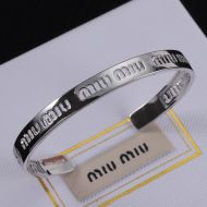 Miu Miu Cuff Bracelet With Cut-Out Logo In Metal Silver