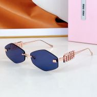 Miu Miu SMU 5692TS Sunglasses With Strass Logo In Metal Blue