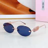 Miu Miu SMU 5693TS Oval Sunglasses With Strass Logo In Metal Blue